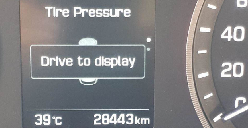 پیغام TIRE PRESSURE - DRIVE TO DISPLAY به چه معناست؟